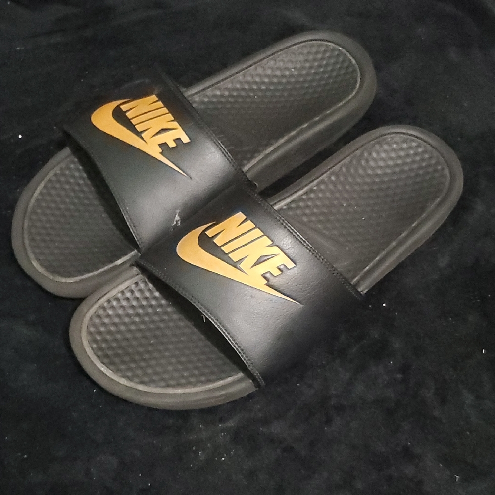 Nike Black Slides with Gold Logo